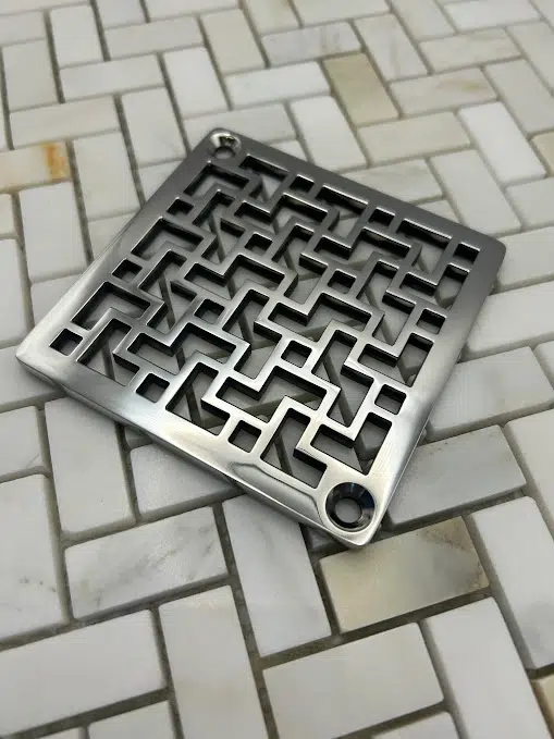 Tulun Schluter Square Drain in Polished Stainless Steel Finish.