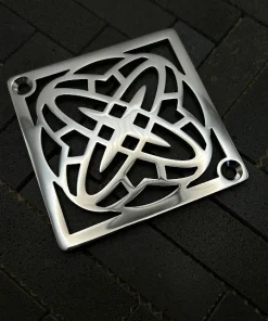 Square atom rings drain with polished stainless steel finish.