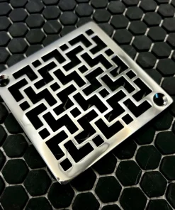 Square drain in tulun design with polished stainless steel finish.