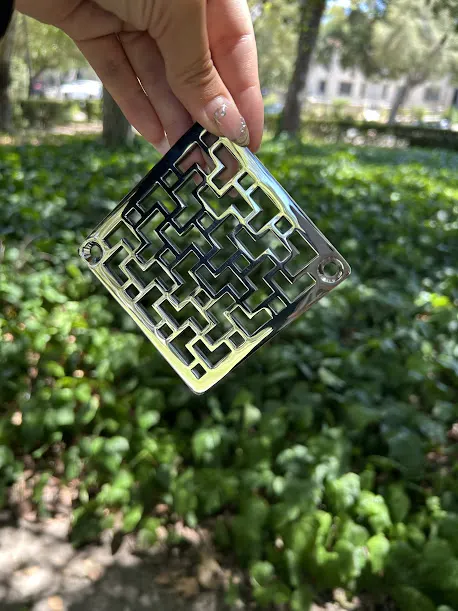 Tulun Schluter Square Drain in Polished Stainless Steel Finish.