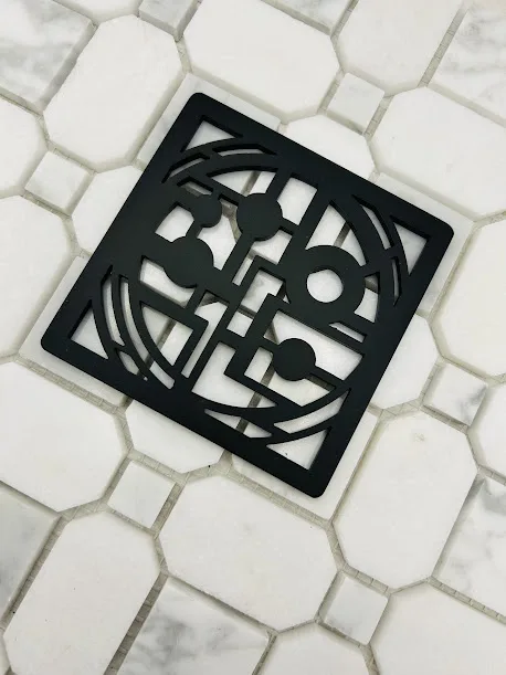 Square drain with matte black finish.