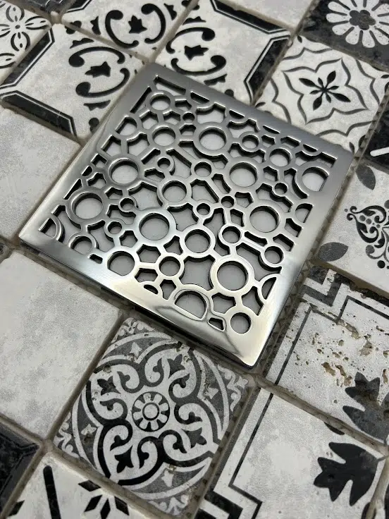 Square drain in Polished stainless steel finish.