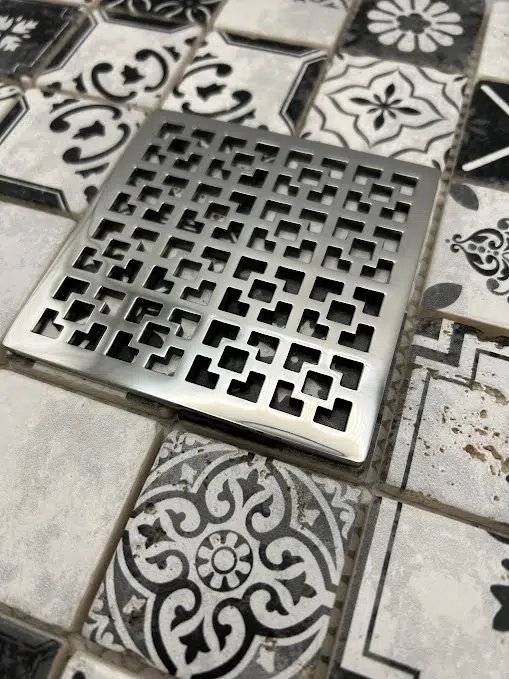 Square drain in Polished stainless steel finish.