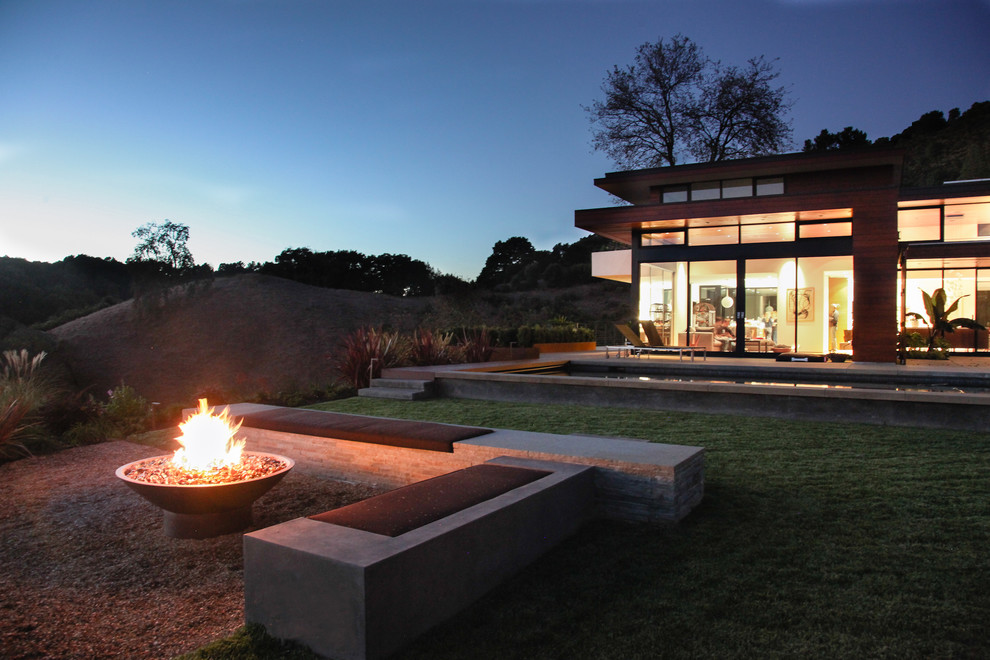 cast-iron-fire-pit-in-landscape-modern-with-concrete-patio-bench-7