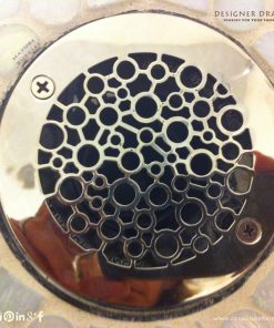 round shower drain with bubbles design