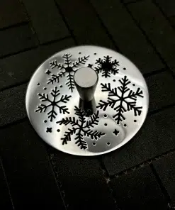 Round sink strainer with polished stainless steel finish.