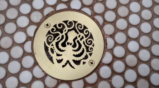 Octopus-4-inch-round-drain-brushed-brass_13937_Designer-Drains