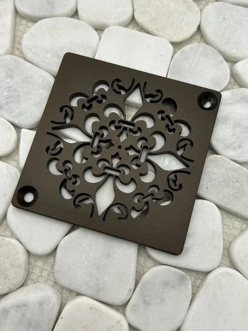 Square drain with oil rubbed bronze finish.