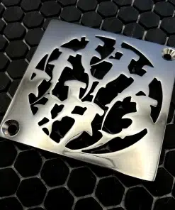 Square drain with sharks design in polished stainless steel finish.