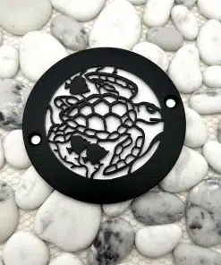 Round drain with turtle design in matte black finish.