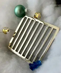 Square Schluter Trendline drain in polished nickel finish.