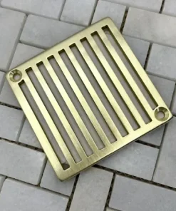 square shower drains | schluter replacement | verticals design | unlacquered brushed brass on white tile