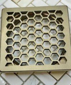 Honeycomb Trendline shower drain in rough champagne bronze