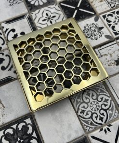 Schluter Trendline drain in Polished Brass finish.