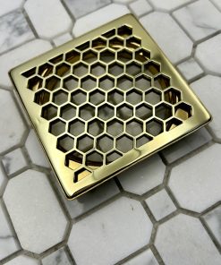 Schluter Trendline drain in Polished Brass finish.