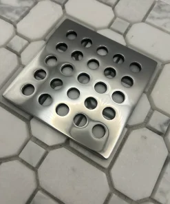 Square drain in Polished stainless steel finish.