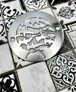 4in round sharks polished stainless steel on black decor tile