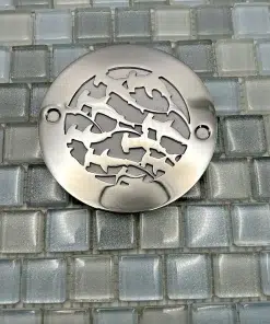 Round drain with Sharks design in polished stainless steel finish.