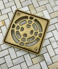 Schluter-Kerdi drain with Frame in champagne Bronze finish.