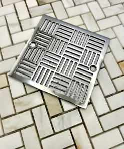 Square drain with Geometric squares 6 design in polished stainless steel finish.