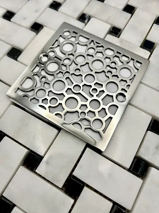 Square drain in Polished stainless steel finish.
