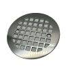 Round drain with polished stainless steel finish.