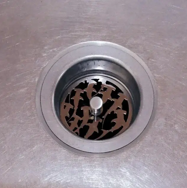 Sharks Strainer polished stainless steel in sink