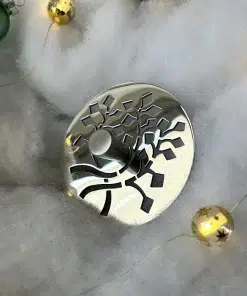 Nature Leaves sink stopper in polished stainless steel finish.