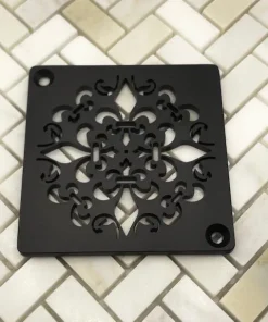 Mon Fleur Schluter shower drain cover, matte black by Designer Drains.