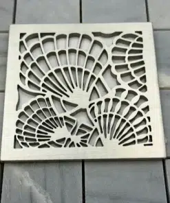 Seashells square shower drain brushed stainless steel on tile