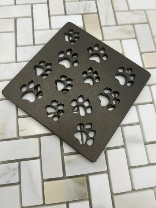 Square drain with oil rubbed bronze finish.