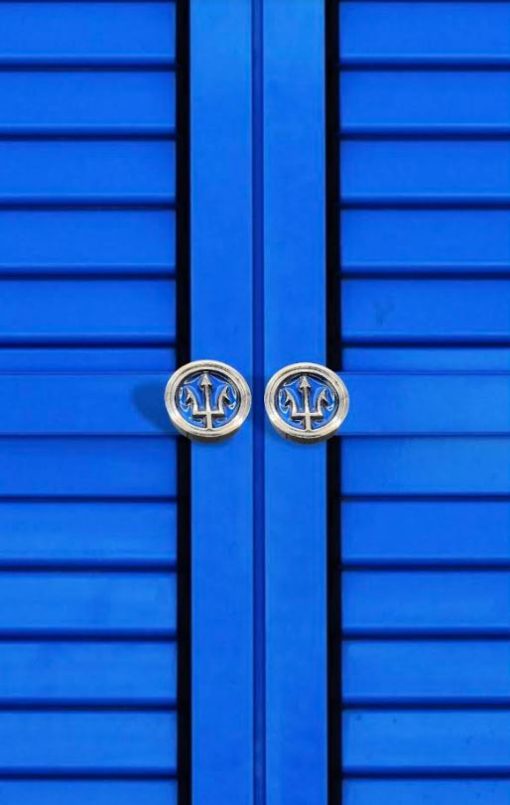 Trident-Knob-on-blue-cabinet2_Designer-Drains