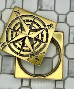 Designer Drains 4-inch Schluter-Kerdi Trendline-style drain cover with no fastening holes, brass finish