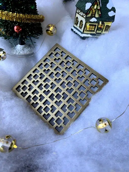 Square Drain in Champagne Bronze Finish.