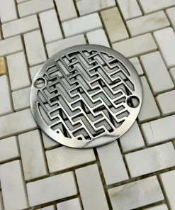 Round drain in Polished stainless steel finish.