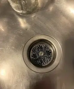 Greek Anthemion polished stainless steel in sink
