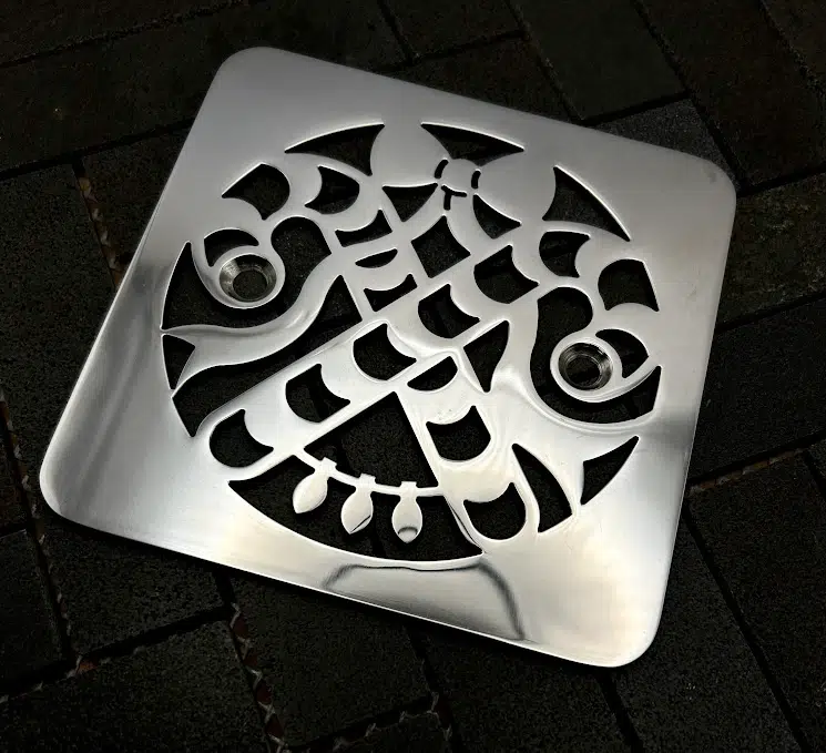 Square drain in Polished stainless steel finish.