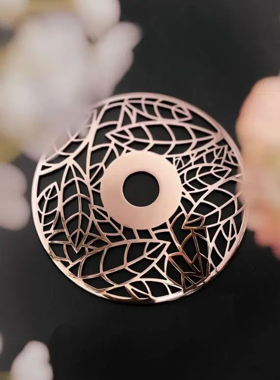 Almond Leaves Escutcheon Plate in polished copper by Designer Drains