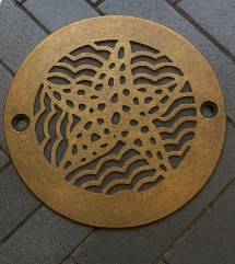 Starfish shower drain patina unlacquered brass