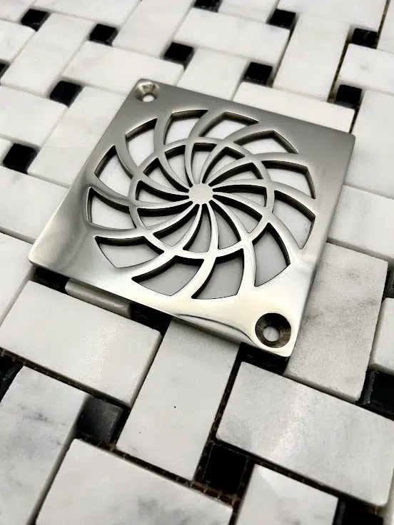 Square drain in Polished stainless steel finish.